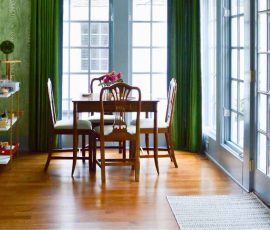 Breakfast area with table and chairs near the window